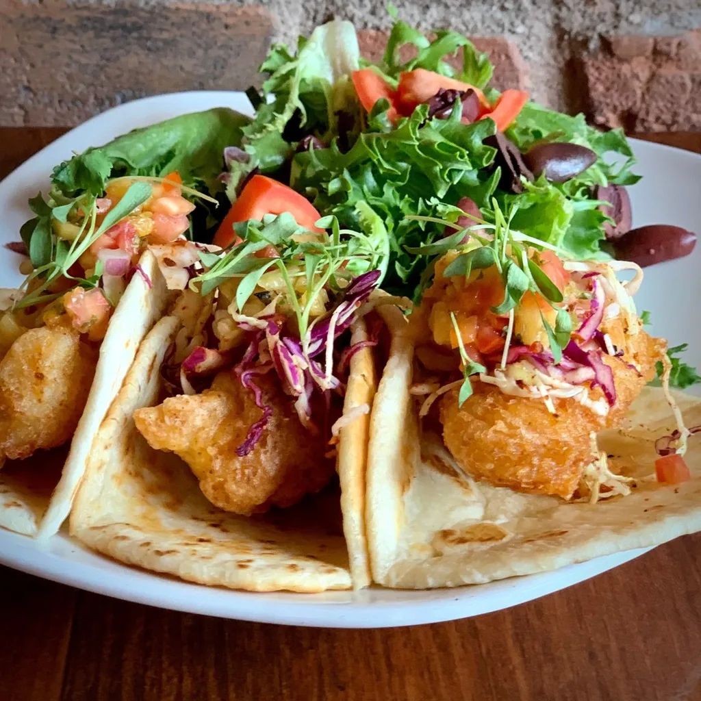 Chef plating dishes in the kitchen