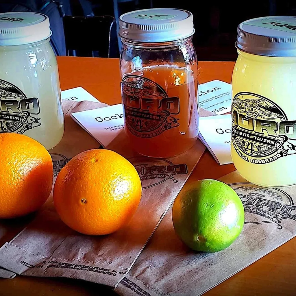 Wine being poured into a glass at the table